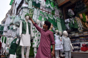 Student create a vibrant national flag at Alhamra Arts Council's summer camp for Independence Day.