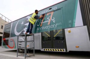 A view of BRT bus decorated with national flag for the celebrations of 77 Independence Day at Trans Peshawar Terminal.
