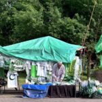 A vendor selling flags and children clothes to mark the 78th Independence Day celebrations