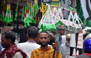 Student create a vibrant national flag at Alhamra Arts Council's summer camp for Independence Day.