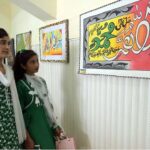 Young Girls are visiting calligraphic exhibition at Sargodha Arts Council during celebration of Independence Day
