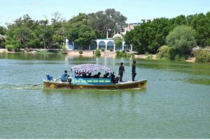 Devoted visitors enjoy a leisurely boat ride during the 281st Urs celebrations at the shrine of Hazrat Shah Abdul Latif Bhitai with devotion and festive spirit.