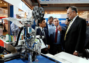 Federal Minister for Planning and Development, Ahsan Iqbal cutting ribbon to inaugurate Textile Asia Exhibition at Expo Center