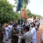 SP Patrolling Police Akhter Hussain Joya and other officials Hoisting Flag during celebrating Independence Day at Patrolling Check Post Chak No 40. Shumali