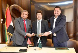 Consul General of Pakistan in Dubai, Hussain Muhammad, witnesses an MoU signing ceremony between Pakistan Association Dubai (PAD) and Ulearn LLC at PAD.