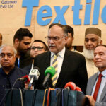 Federal Minister for Planning and Development, Ahsan Iqbal cutting ribbon to inaugurate Textile Asia Exhibition at Expo Center