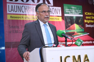 Federal Minister for Planning Development & Special Initiatives of Pakistan, Ahsan Iqbal is talking to the media at ICMA