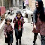 Students on their way as the schools open after summer vacations in the city