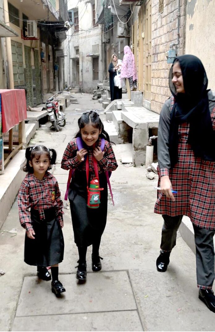 Students on their way as the schools open after summer vacations in the city