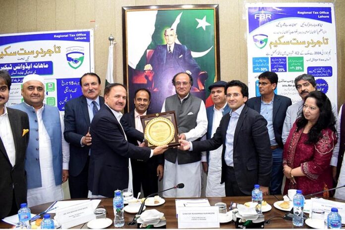 Federal Minister of Finance and Revenue Senator Muhammad Aurangzeb in meeting with Trade representatives at Regional Tax Office