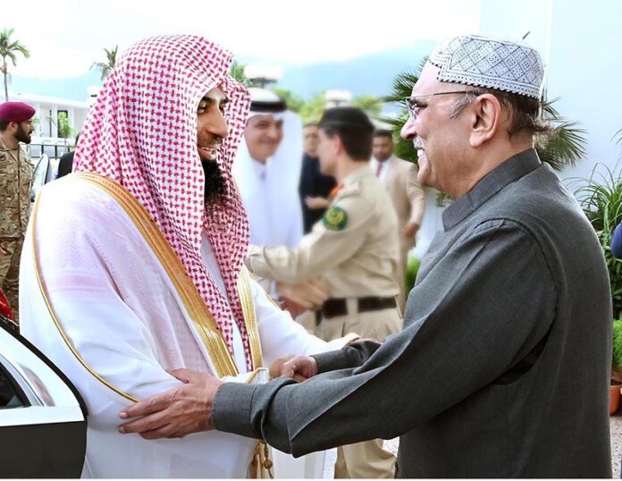 President Asif Ali Zardari welcoming the Imam of Masjid Al-Nabvi, Dr Salah Bin Mohammad M Albdeer, upon his arrival, at Aiwan-e-Sadr