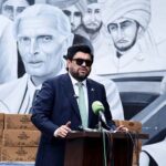 Governor Sindh Kamran Khan Tessori talking to the media after distributing ration bags to the beneficiaries at the Governor House