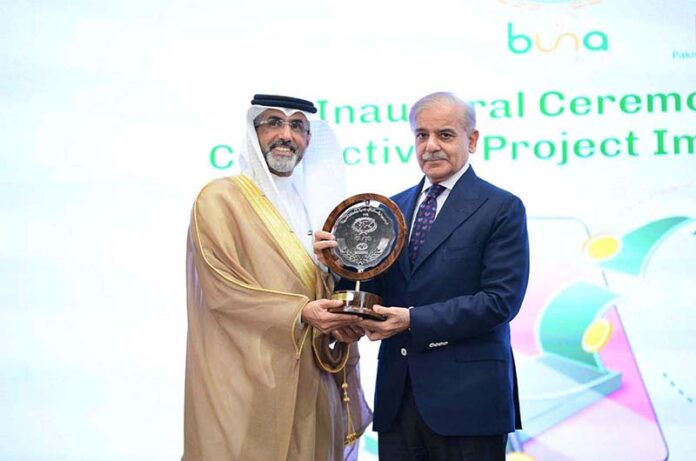 Prime Minister Muhammad Shehbaz Sharif presenting a memento to Chairperson Arab Monteray Fund Dr. Fahad M Alturki at the inaugural ceremony of Buna-Raast Connectivity Project Implementation Phase