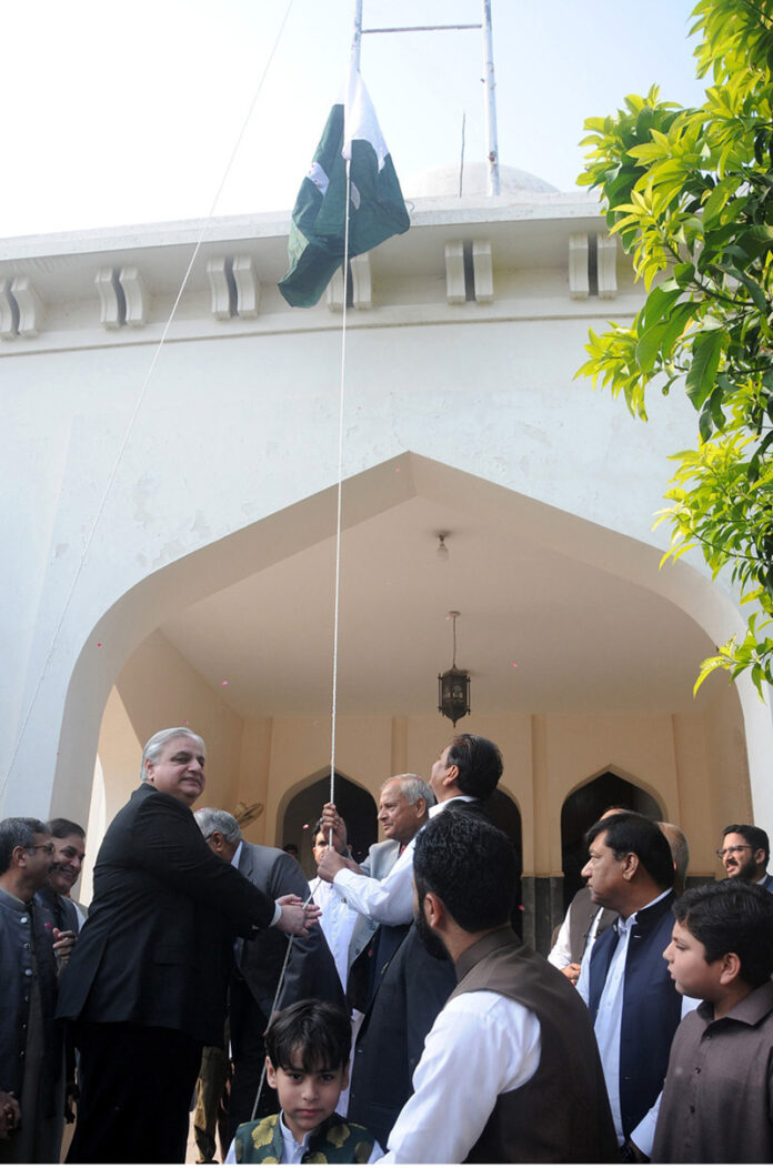Mr. Justice Muzammil Akhtar Shabbir is hoisting Pakistan’s national flag at the official flag hoisting ceremony on the 77th Independence Day of Pakistan at the High court
