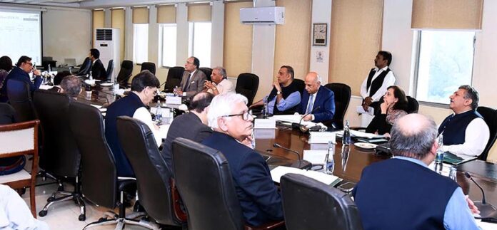 Federal Minister for Finance & Revenue Senator Muhammad Aurangzeb presiding over a meeting of Economic Coordination Committee (ECC)
