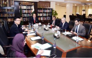 Federal Minister for Finance and Revenue Senator Muhammad Aurangzeb and Minister for Power Sardar Awais Ahmad Khan Leghari in a meeting with the delegation of Port Qasim Electric Power Company (PQEPC).