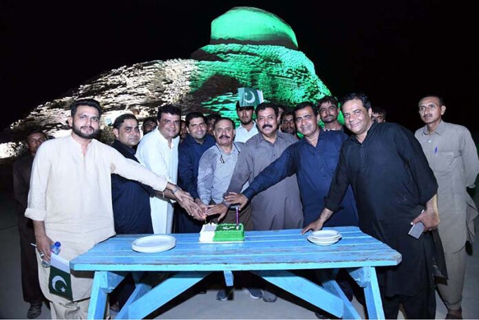 An eye catching view of Stoppa a spot at Mohenjo-daro (Mound of dead) remains of the most impressive city of the Indus Valley Civilization, decorated with national flag colorful lights to commemorate the Independence Day of Pakistan