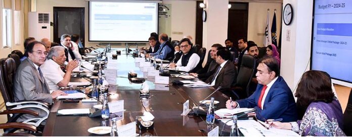 Federal Minister for Finance & Revenue Senator Muhammad Aurangzeb presiding over a meeting of Economic Coordination Committee (ECC)