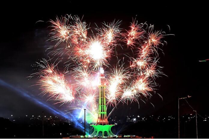 An attractive view of fireworks at Minare-e-Pakistan (Greater Iqbal Park) to mark Independence Day celebrations in the Provincial Capital