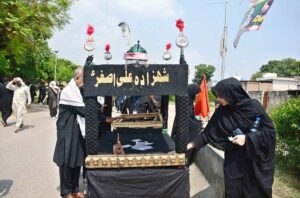 A large number of mourners attending Chehlum procession to commemorate the martyrdom of Hazrat Imam Hussein (RA) the grandson of Holy Prophet Muhammad (PBUH).