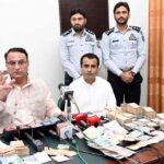 Director FIA Abdul Hameed Bhutto briefs the media persons about arrested 4 accused involved in hundi and illegal currency exchange during a press conference at FIA Office