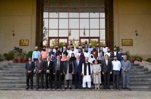 Islamic Scholars from Afghanistan and various universities from all over Pakistan posing group photo with Mr. Justice Syed Mansoor Ali Shah, Judge Supreme Court of Pakistan, at the Federal Judicial Academy
