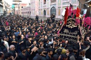 Mourners attending the Chehlum procession to commemorate the martyrdom of Hazrat Imam Hussain (RA) the grandson of Holy Prophet Muhammad (PBUH).