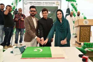 Hussain Muhammad, Consular General cutting cake during the flag hoisting ceremony held in the Consulate General of Pakistan
