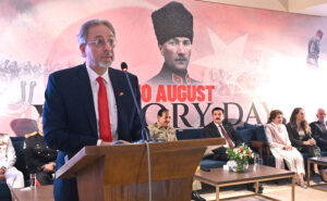 The Ambassador of the Republic of Tukiye Dr. Mehmet Pacaci addresses on the occasion of Victory Day reception at a local hotel.