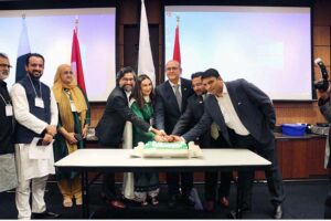Acting High Commissioner, Shah Faisal Kakar is cutting cake on Independence Day celebrations with Canada-Pakistan Association.