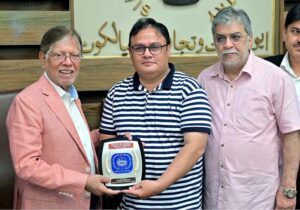 The business community cuts a cake at a special ceremony at Sialkot Chamber of Commerce and Industry (SCCI) in honor of Arshad Nadeem's historic Gold Medal win in the Javelin throw at the Paris Olympics 2024