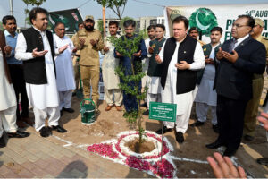Additional Chief Secretary South Punjab Fawad Hashim Rabbani in a group photo with Students during the plantation on the ceremony of 77th Independence Day of Pakistan