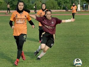 Female football players of Highlanders WFC vs Hazara Quetta WFC teams in action during the National Women’s Football Club Championship 2024 Final Round at Sports Complex.