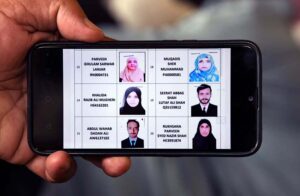 Relatives in mourning and grief gather at Shamsi Imambargah, deeply affected by the recent bus crash in Iran that claimed the lives of their loved ones.
