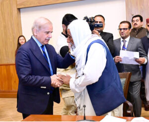 Prime Minister Muhammad Shehbaz Sharif distributes cheques among the families of people who martyred in terrorist attacks in Balochistan.
