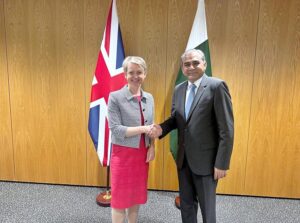 Federal Minister for Interior Mohsin Naqvi shaking hands with British Home Secretary Yvette Cooper in London.