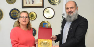 As a gesture of goodwill, Federal Minister for Commerce Jam Kamal presenting a traditional "Shaal" to Germany's Minister Svenja Schulze, who reciprocated with a German souvenir.