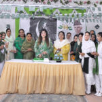 Professor Dr. Nighat, Associate College for Women Dhok Ilahi Bakhsh along with the staff and students cutting cake to celebrate the Independence Day of Pakistan