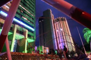 An illuminated view of the OGDCL building decorated with colorful lights in connection with the Independence Day celebration.