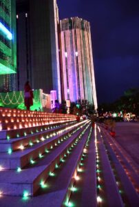 An illuminated view of the OGDCL building decorated with colorful lights in connection with the Independence Day celebration.