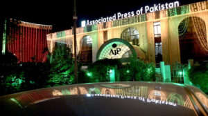 An eye catching view of Presidency and Parliament House building, decorated with colorful lights to commemorate the Independence Day of Pakistan.