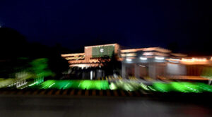 An eye catching view of Presidency and Parliament House building, decorated with colorful lights to commemorate the Independence Day of Pakistan.