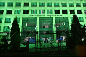 A view of the Civic Center building illuminated with lights on the eve of Independence Day celebrations