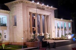 The Punjab Assembly building shines brightly, illuminated with lights in celebration of Independence Day.