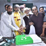 Leader of PML-N, Member of Provincial Assembly, Chaudhary Faisal Ikram, along with workers, cut cake to commemorate the Independence Day in Rangpura