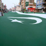 Pakistan Markazi Muslim League displays 1 km long national flag to commemorate the Independence Day on Sadar Road