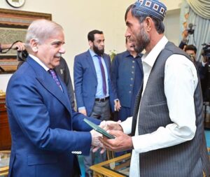 Muhib Ullah Kakar, an excavator driver who saved a family stranded in flash flood in Qilla Abdullah calls on Prime Minister Muhammad Shehbaz Sharif.