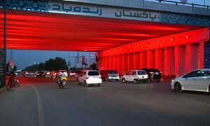 A view of newly installed colorful lights under a bridge at Zero Point in Federal Capital