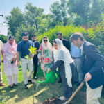 PM's Coordinator on Climate Change & Environmental Coordination (MoCC&EC), Romina Khurshid Alam, planting a tree to celebrate Eid-i-Miladun Nabi (PBUH). Secretary, MoCC&EC, Aisha Humera Ch and other officials are can be seen in the image