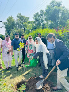 PM's Coordinator on Climate Change & Environmental Coordination (MoCC&EC), Romina Khurshid Alam, planting a tree to celebrate Eid-i-Miladun Nabi (PBUH). Secretary, MoCC&EC, Aisha Humera Ch and other officials are can be seen in the image